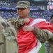 Maryland National Guard Soldiers and Airmen display flag at Baltimore Ravens Game