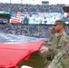 Maryland National Guard Soldiers and Airmen display flag at Baltimore Ravens Game