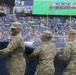 Maryland National Guard Soldiers and Airmen display flag at Baltimore Ravens Game