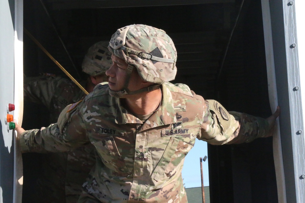 Spartan jumpmaster conducts safety check