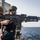 Sailor shoot M240B machine gun on USS Jason Dunham (DDG 109)