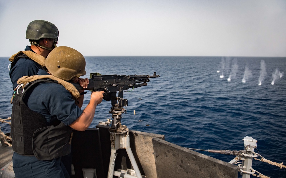 Sailor shoot M240B machine gun on USS Jason Dunham (DDG 109)