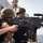 Sailor shoot M240B machine gun on USS Jason Dunham (DDG 109)