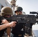 Sailor shoot M240B machine gun on USS Jason Dunham (DDG 109)