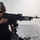 Sailor shoot M240B machine gun on USS Jason Dunham (DDG 109)
