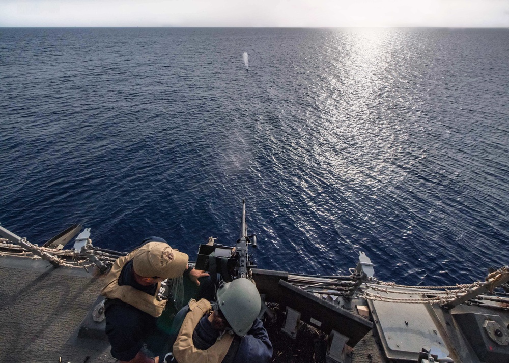 Sailor shoot M240B machine gun on USS Jason Dunham (DDG 109)