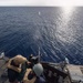 Sailor shoot M240B machine gun on USS Jason Dunham (DDG 109)