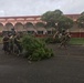Marines and Navy Seabees clear debris on Tinian