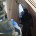 Airmen simulate patient decontamination during base readiness exercise