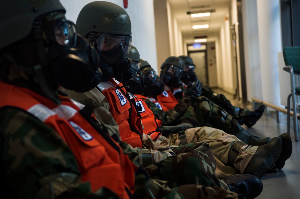 Airmen simulate patient decontamination during base readiness exercise