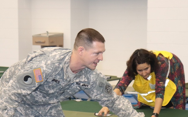 VNG personnel assist setting up state-managed shelters