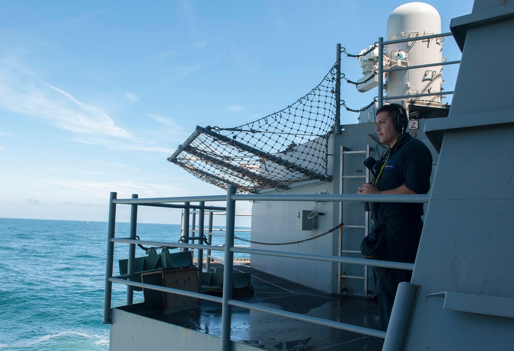 GHWB Sailor stands watch