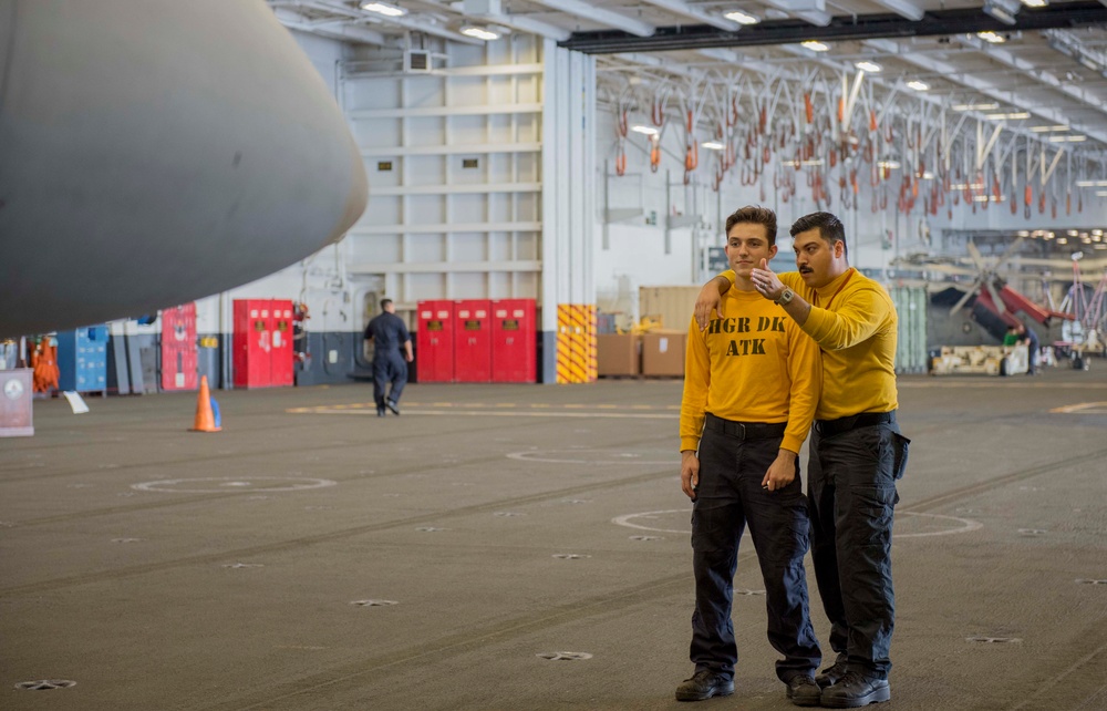 Sailors Practice Manuvering Aircraft