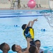 SMP Marines swim with local children during Pool Bash on Camp Kinser