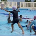 SMP Marines swim with local children during Pool Bash on Camp Kinser