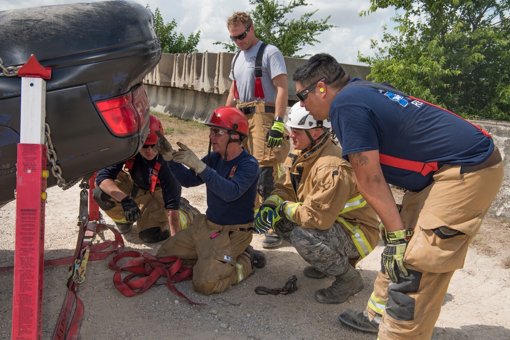 JBSA firefighters participate in “Train the Trainer” vehicle rescue course