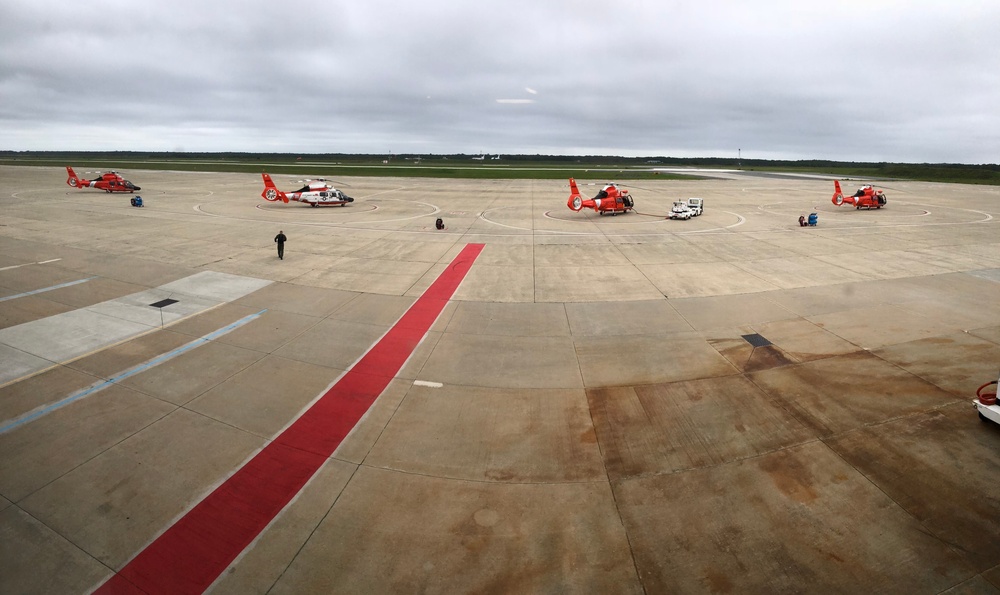 Coast Guard MH-65 Dolphin helicopters preparing to depart for Hurricane Florence response