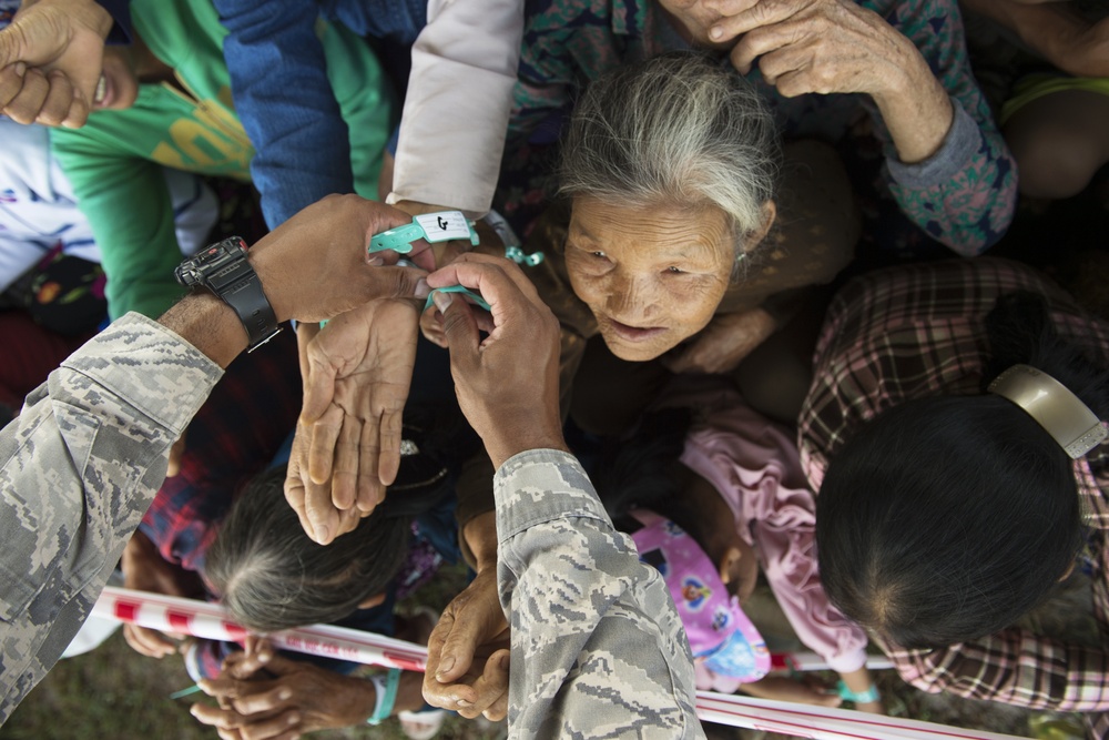 PAC ANGEL 18-2 patients queue for health service outreach event