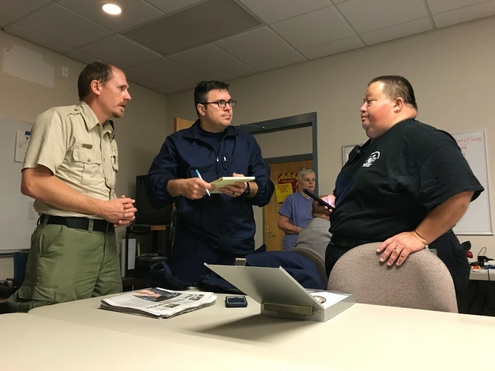 Coast Guard rescue teams meet with North Carolina Emergency Operations Center staff