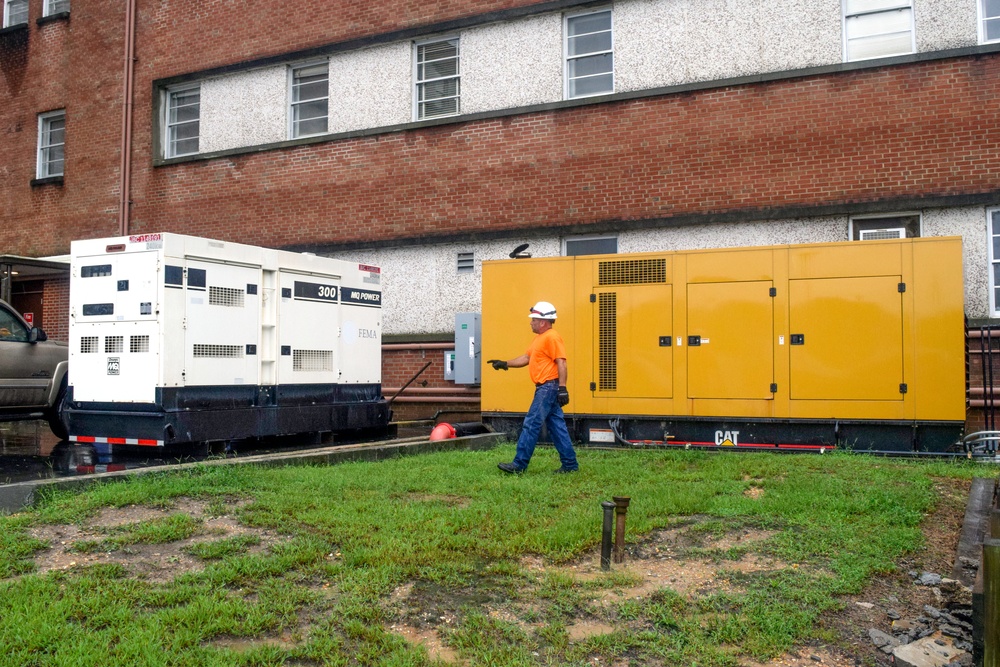 Corps contractors install temporary power to a section of Cherry Hospital in Goldsboro, NC