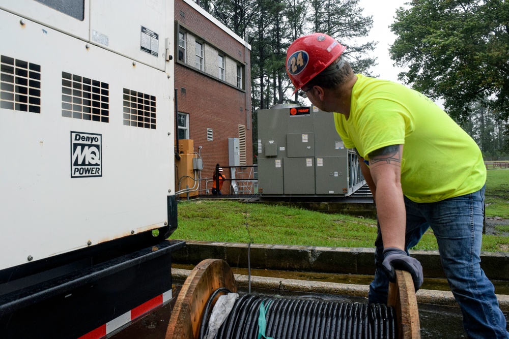 Corps contractors install temporary power to a section of Cherry Hospital in Goldsboro, North Carolina