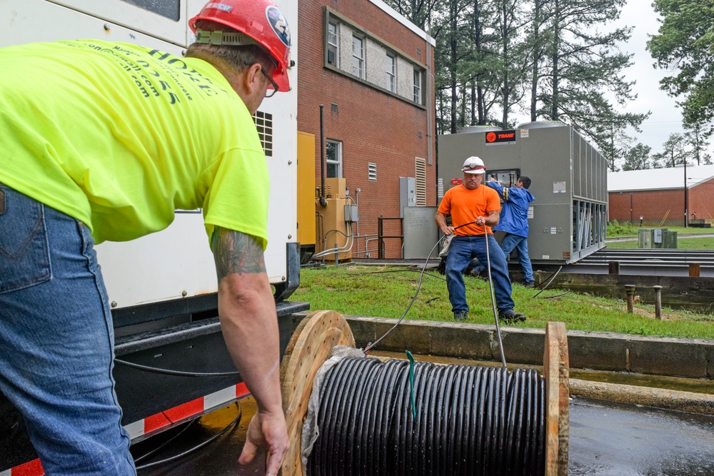 Corps contractors install temporary power to a section of Cherry Hospital in Goldsboro, North Carolina