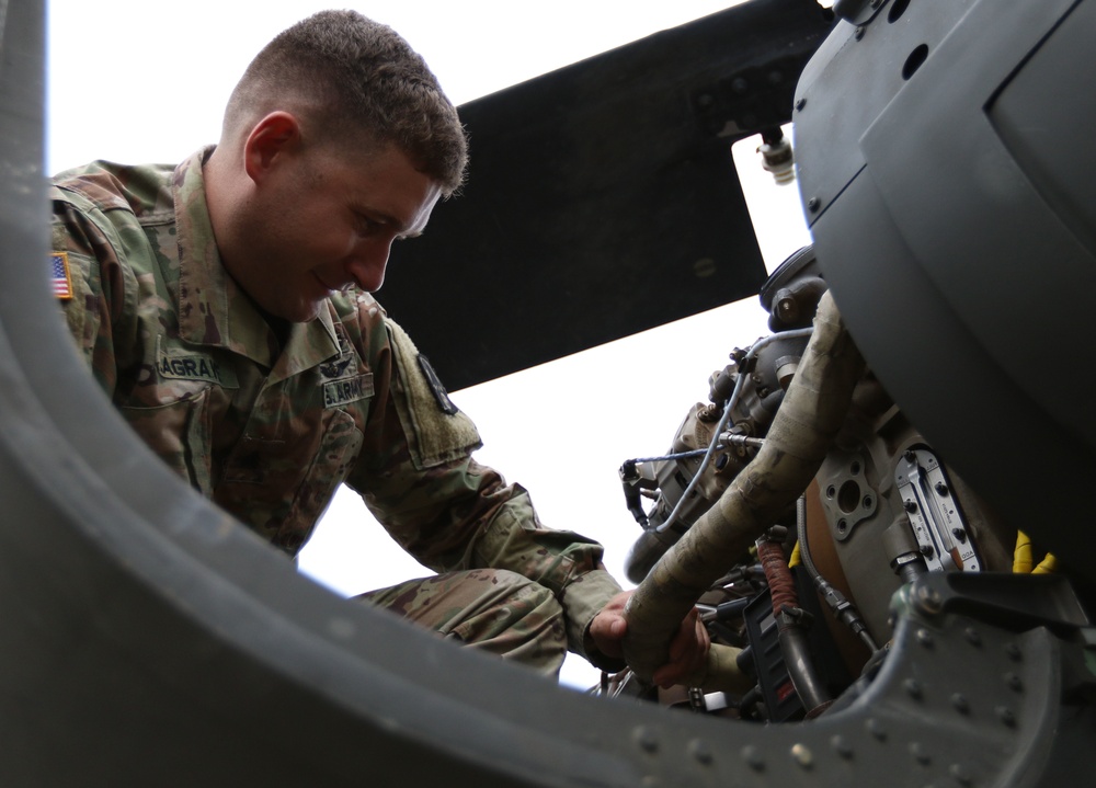 Last minute checks: U.S. Army Reserve Soldiers prepare helicopters for hurricane response