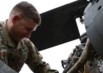 Last minute checks: U.S. Army Reserve Soldiers prepare helicopters for hurricane response