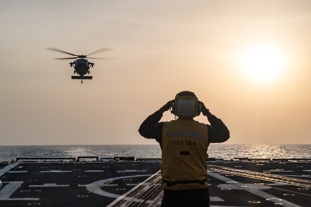 USS Jason Dunham (DDG 109) helo ops at sunset