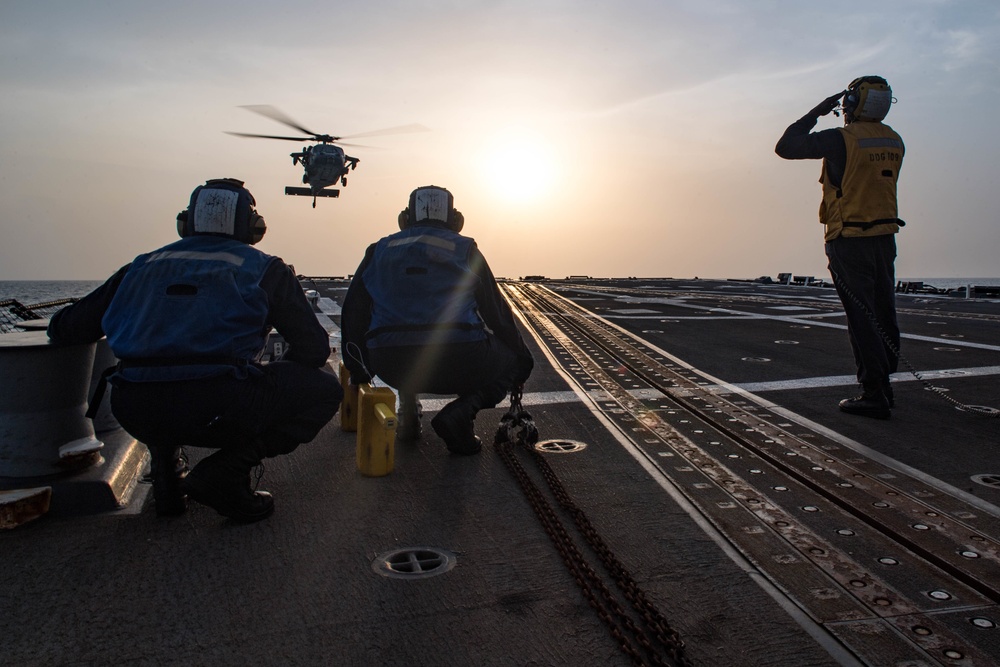 USS Jason Dunham (DDG 109) helo ops at sunset