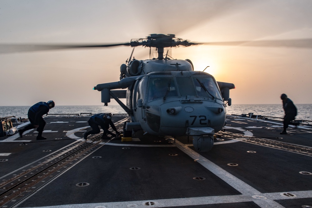 USS Jason Dunham (DDG 109) helo ops at sunset
