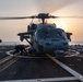 USS Jason Dunham (DDG 109) helo ops at sunset