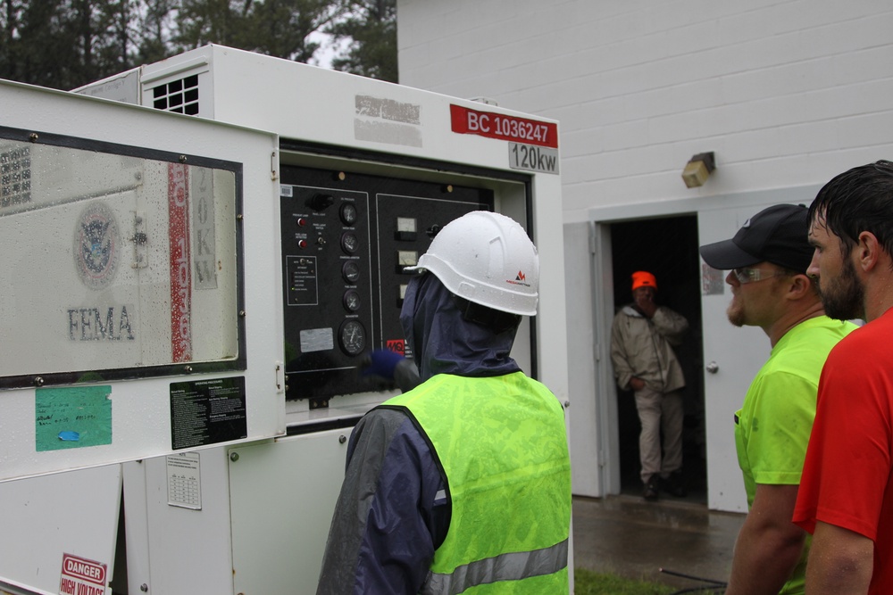 Corps contractors install temporary power to Hoke County, NC water treatment facility.