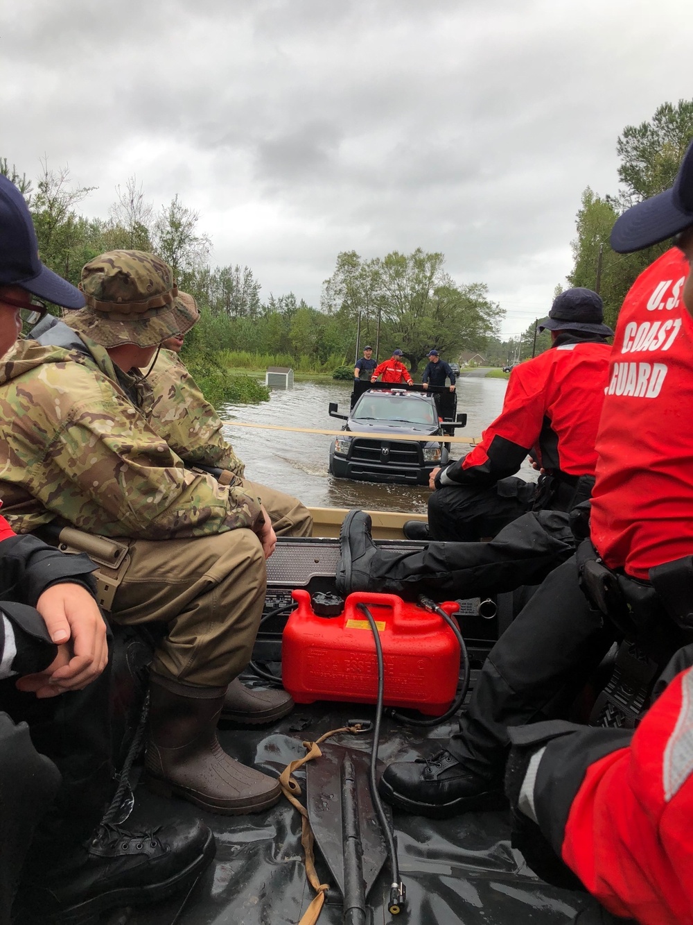 Coast Guard members conduct shallow-water rescue boat operations