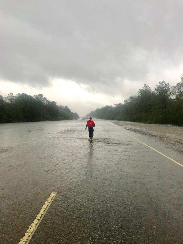 Coast Guard Examines Roadway after Floodwaters