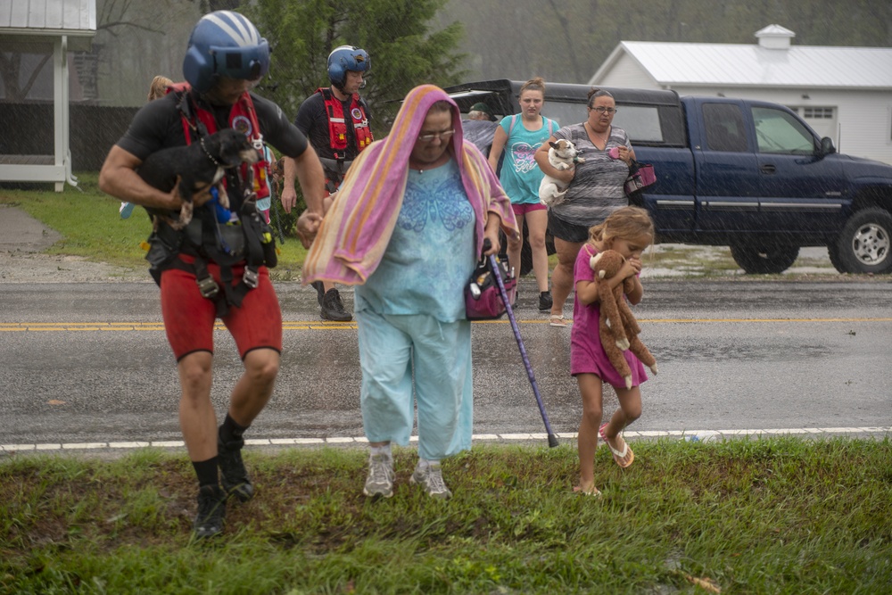 Coast Guard Rescues 37 People, 7 Dogs, 4 Cats from Flooding in North Carolina After Hurricane Florence