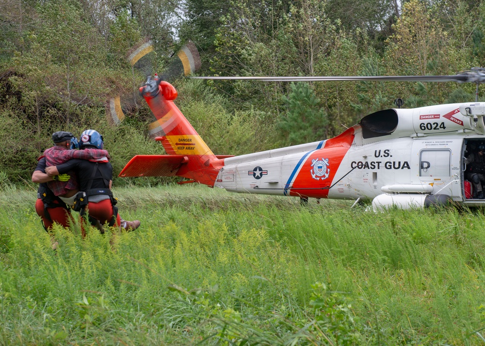 Coast Guard Rescues 37 People, 7 Dogs, 4 Cats from Flooding in North Carolina After Hurricane Florence