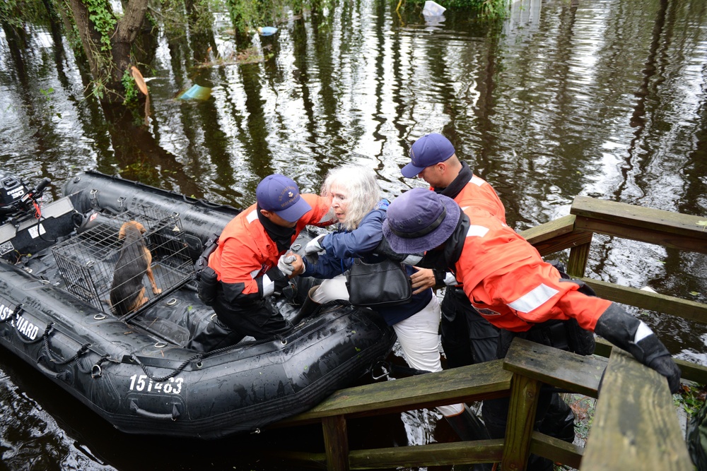 Coast Guard rescues elderly couple and pets from flooding