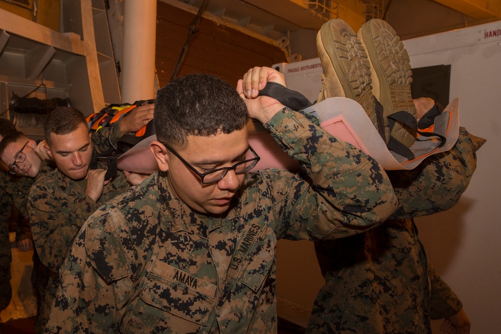 Marines practice emergency procedures aboard ship