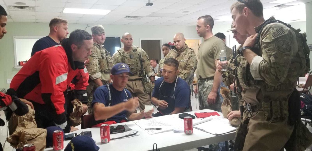 Coast Guard and Army strategize during morning operations meeting
