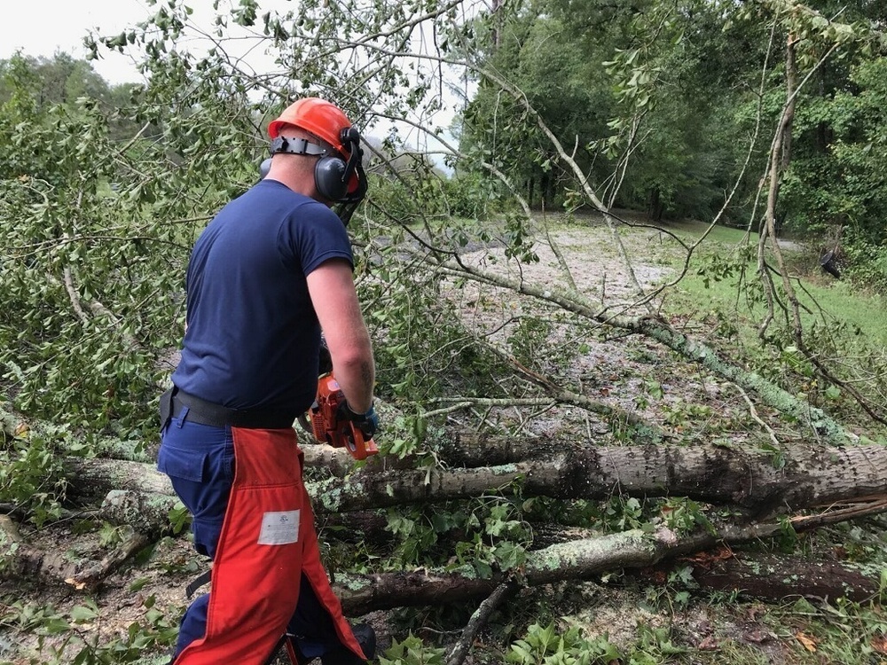 Coast Guard assists in clearing roadways of debris