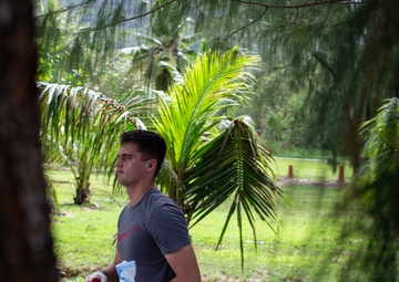 Marine Aircraft Group 12 cleans Agat beach where Marines landed 74 years ago