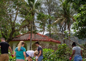 Marine Aircraft Group 12 cleans Agat beach where Marines landed 74 years ago