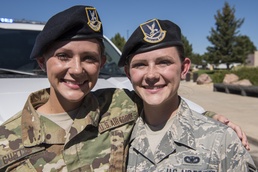 Identical twins progress together in service