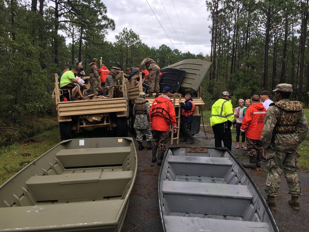 Coast Guard, local partners surge into flood zones for rescue operations
