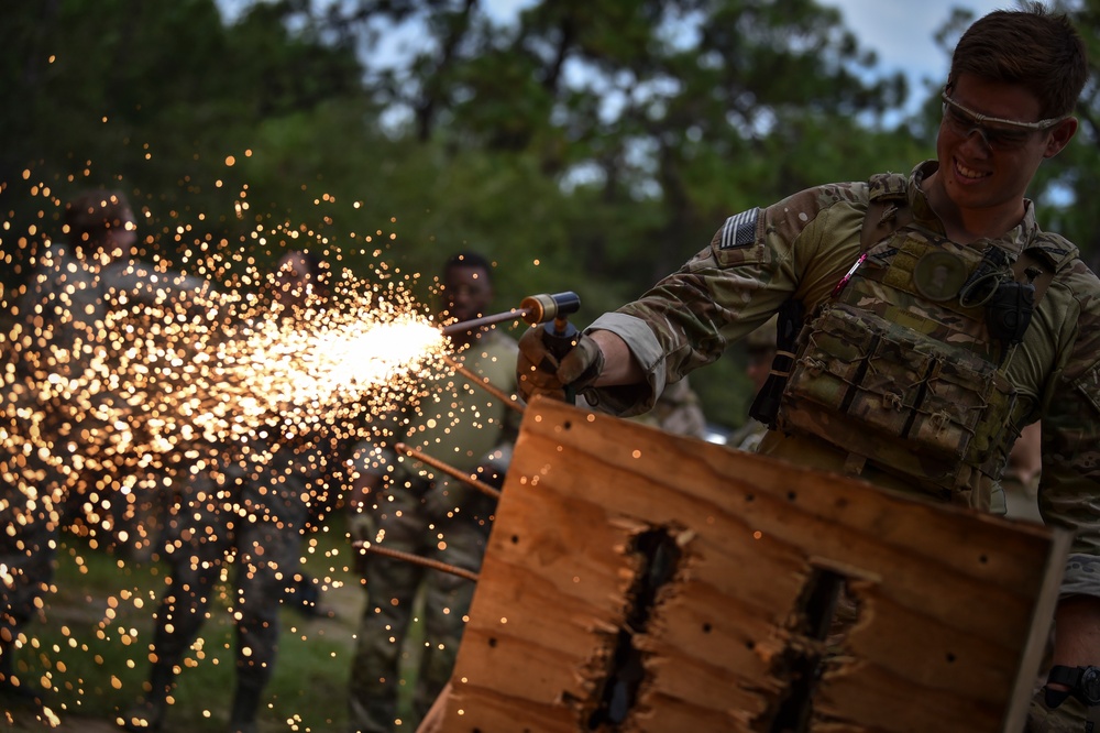 Security Forces Airmen conduct breaching and clearing training