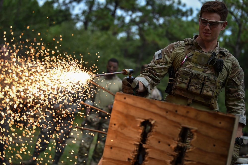 Security Forces Airmen conduct breaching and clearing training