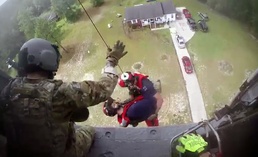 Members of 106th Rescue Squadron go in for the save during Hurricane Florence