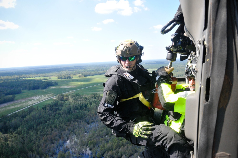 Civilian responders assist in flood relief mission