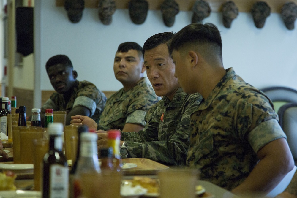 Marines break bread with the Sgt. Maj. of the Republic of Korea Marines